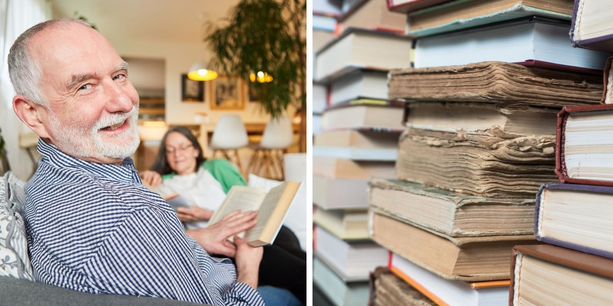 En man läser en bok och gamla böcker.