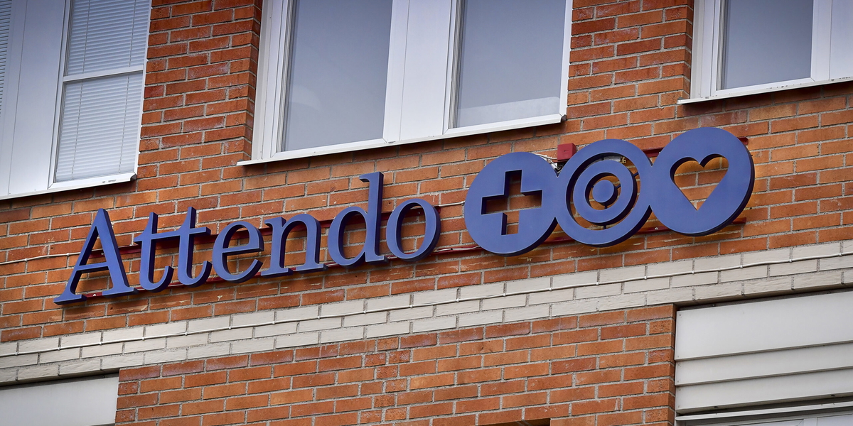 Bokslut från Attendo. Arkivbild