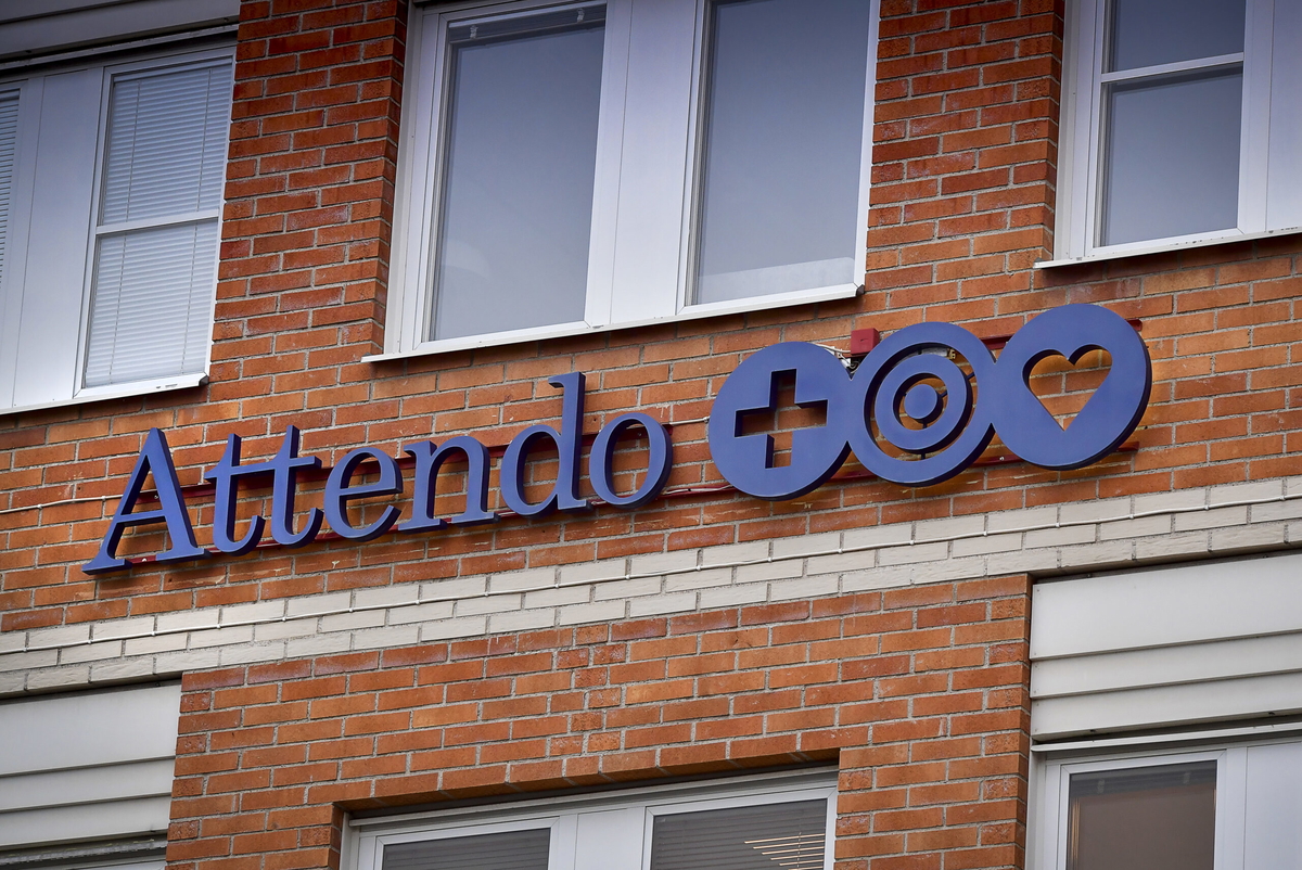 Bokslut från Attendo. Arkivbild