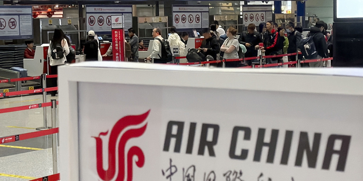 Passagerare som ska flyga från Peking med Air China tidigare i veckan.