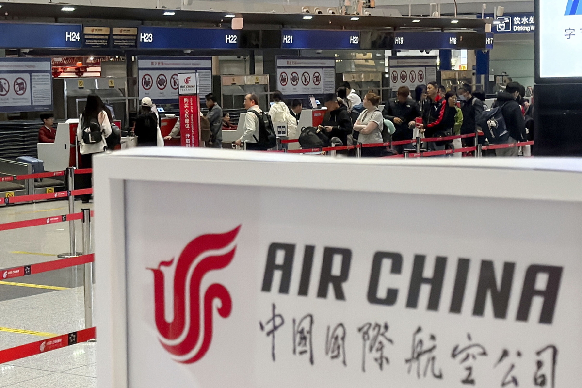 Passagerare som ska flyga från Peking med Air China tidigare i veckan.